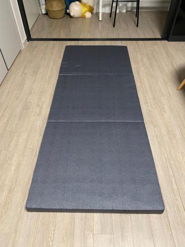 a gray rug on the floor in a room at Near Incheon airport, China town, Songdo, Inha Uni Hospital in Incheon