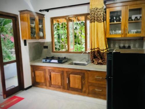 Una cocina o cocineta en Sunil Villa