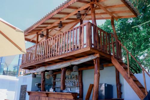 a wooden deck on the side of a house at Sunset Cove Ahangama in Ahangama