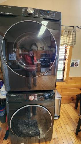a microwave oven sitting on top of another appliance at Little Cabin All To Yourself in Sevierville