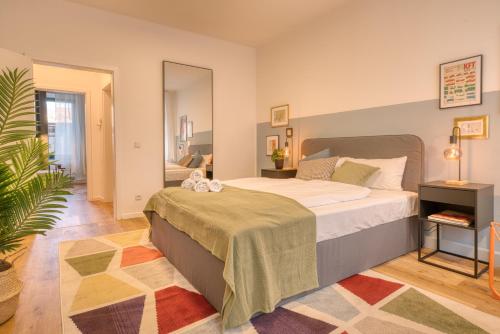 Postel nebo postele na pokoji v ubytování FullHouse Premium Apartments H11