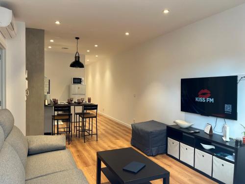Televisyen dan/atau pusat hiburan di Apartamento Xogo da Ola En el camino De Santiago