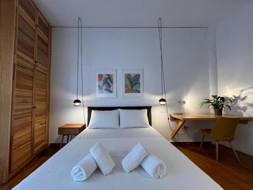 Postel nebo postele na pokoji v ubytování Lovely Studio Apartment