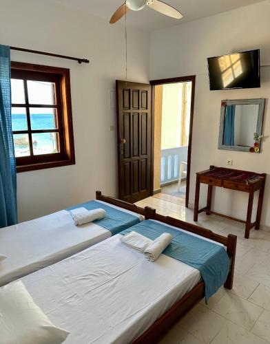 Postel nebo postele na pokoji v ubytování BONATSA Rooms 2