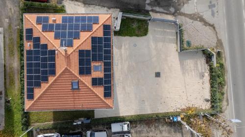 an aerial view of a roof with solar panels on it at Bellaria Palace - In the hearth of Motor Valley in Modena