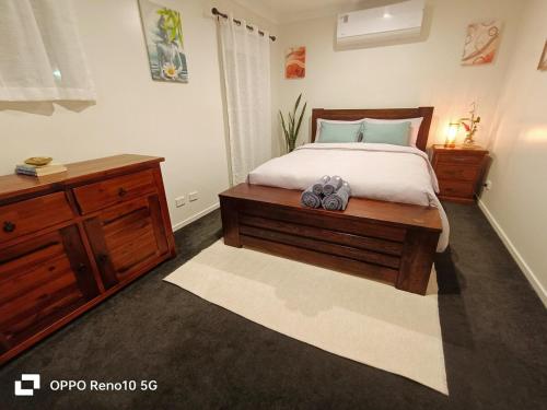 Ένα ή περισσότερα κρεβάτια σε δωμάτιο στο Deluxe Queen Room