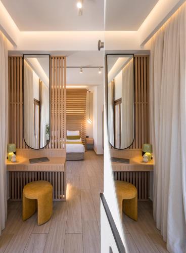 Katil atau katil-katil dalam bilik di Agave Suites
