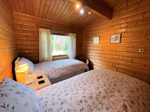 Gorgeous 3BR Norwegian Lodge with Stunning Views Pass the Keysにあるベッド