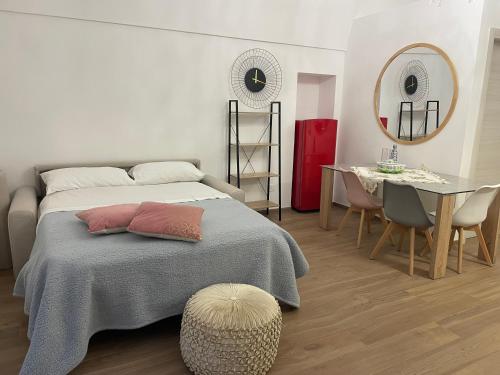 Postel nebo postele na pokoji v ubytování B&B Case Vacanza Orchidea marina di Macchia vicino a Mattinata Gargano