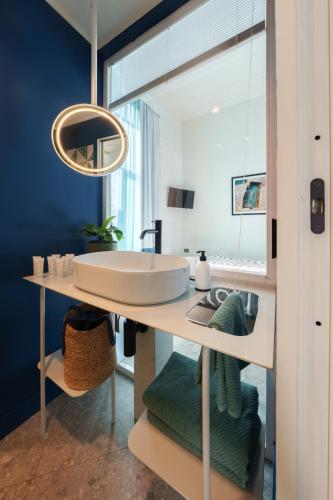a bathroom with a sink and a mirror at 1912 Relais - Sorrento Coast in Piano di Sorrento