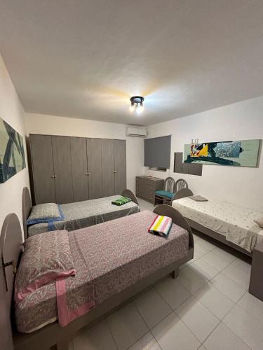 Llit o llits en una habitació de Principal Guest House