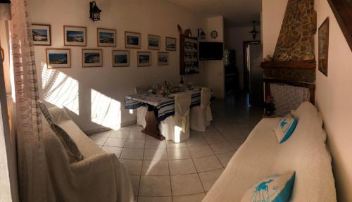 Posezení v ubytování Andrea Frau - Casa Mandorleto new - Sardinia Villasimius-Peaceful Panoramic Terrace-full comfort air conditioning-WiFi-Parking-Privacy