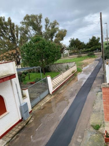 an empty street with a bridge over a road at Casa Ari in Casalabate