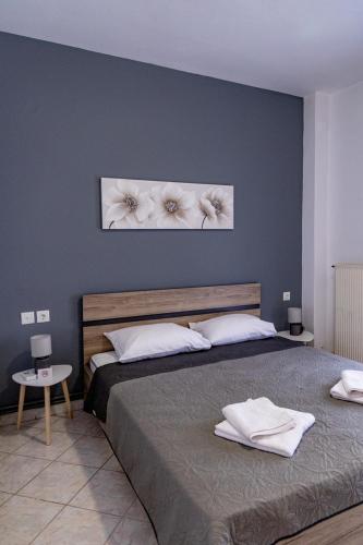 Postel nebo postele na pokoji v ubytování ANGO City Center