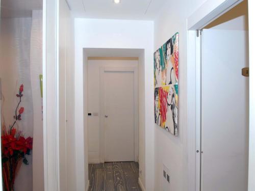 a hallway with a door leading into a room at Divine Bed & Breakfast in Rome