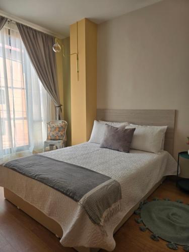 Кровать или кровати в номере Muy cerca del aeropuerto apartamento Nuevo Familiar Lindo y acogedor
