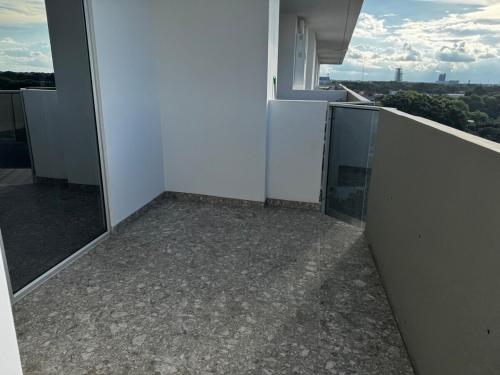 a balcony of a building with a view of the city at Luxurious and Spacious Family Apartment in Curupau Isuto in Santa Cruz de la Sierra