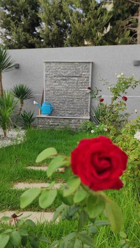 Un jardín fuera de Villa Perle mémorable séjour vous attendent