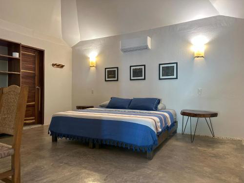 Кровать или кровати в номере Hotel Gallo de Mar