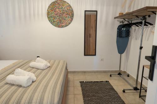 Ένα ή περισσότερα κρεβάτια σε δωμάτιο στο Ioanna's Sweet Home Flogita