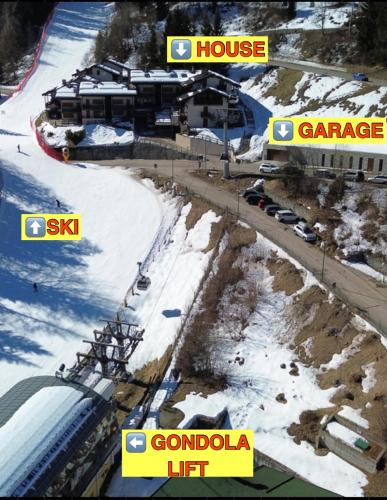 arial view of a ski resort in the snow at CASA FOLGARIDA 2 BOX AUTO PRIVATI davanti CABINOVIA BELVEDERE in Folgarida