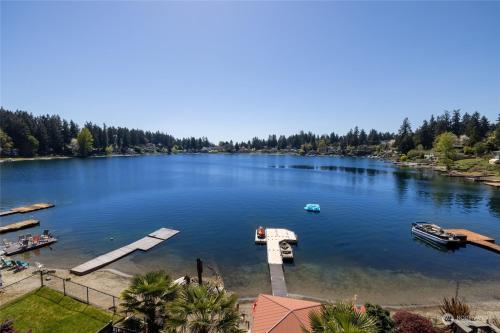 a view of a lake with boats in the water at Luxe At Louise in Tacoma