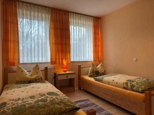 Postel nebo postele na pokoji v ubytování Family Apartment on Rügen