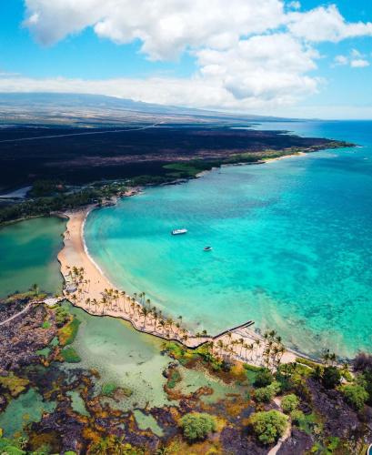 an aerial view of a beach and the ocean at Hale Keanu in Hapuna Beach