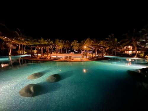 Der Swimmingpool an oder in der Nähe von Villas los cabos le suisse