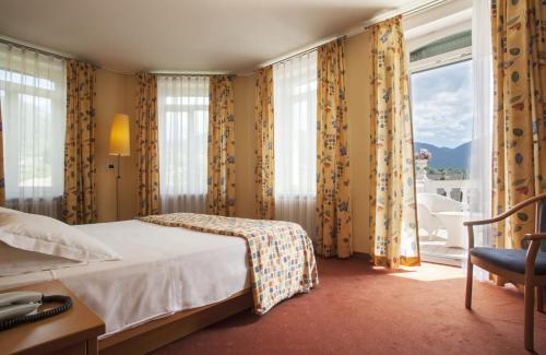 Postel nebo postele na pokoji v ubytování Hotel Luis