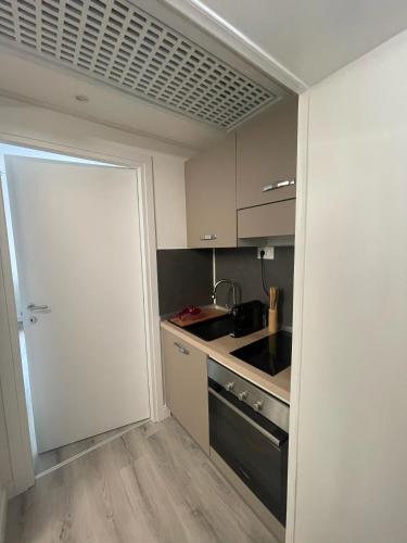 Kuchyň nebo kuchyňský kout v ubytování Casa Flavia-Residenza nel cuore di Ariccia