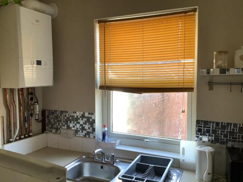 Dapur atau dapur kecil di A greater graced flat near king power stadium ,tigers rugby stadium &LRI hospital