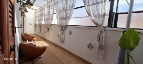 Χώρος καθιστικού στο Il Rifugio Di Ela con 2 appartamenti