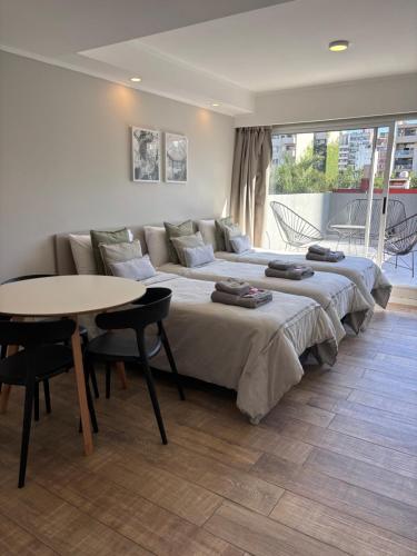 Uma cama ou camas num quarto em Av Suites