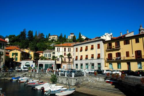 a group of boats are docked in a harbor at Chalet Miralago in Plesio