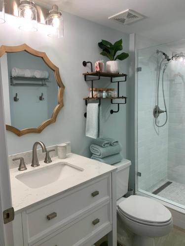 a bathroom with a sink and a toilet and a shower at Ocean Pointe Resorts 3410 Boho in Tavernier