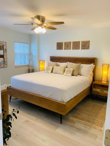 a bedroom with a large bed and a ceiling fan at Ocean Pointe Resorts 3410 Boho in Tavernier