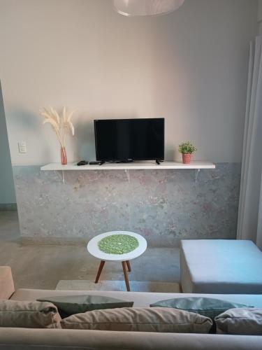 Beachfront apartment Encarnacionにあるテレビまたはエンターテインメントセンター