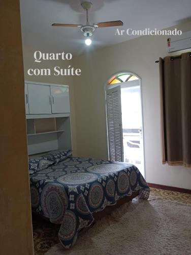 Katil atau katil-katil dalam bilik di Aconchego, Paz , Comodidade e Sucesso