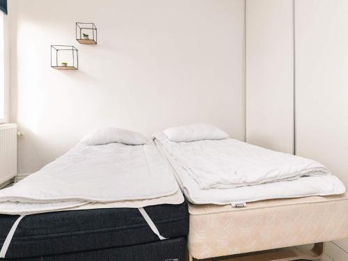 Katil atau katil-katil dalam bilik di 8 person holiday home in Roslev