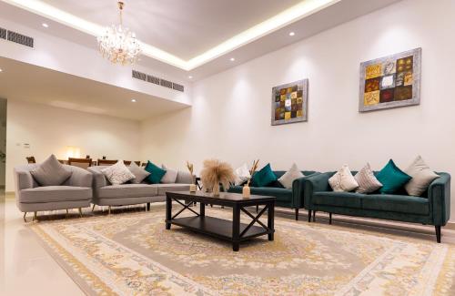 Χώρος καθιστικού στο Al Dana Vitamin Sea Villa