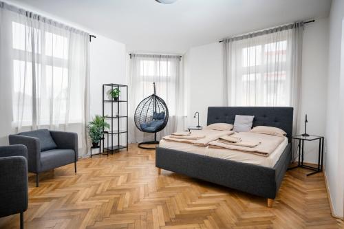 Ένα ή περισσότερα κρεβάτια σε δωμάτιο στο Apartmán náměstí Františka Křižíka