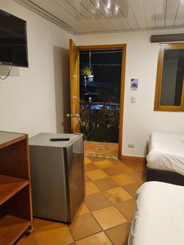 Katil atau katil-katil dalam bilik di Hotel Villa Carlinita
