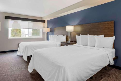 Postel nebo postele na pokoji v ubytování Extended Stay America Premier Suites - Portland - North