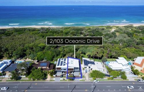 un letrero de la calle que dice disco oceánico en Oceanic-Pet Friendly Townhouse 8min to Mooloolaba, en Parrearra