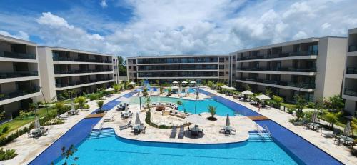 Πισίνα στο ή κοντά στο MALIA Beach Experience FLAT07 - Muro Alto-Porto de Galinhas