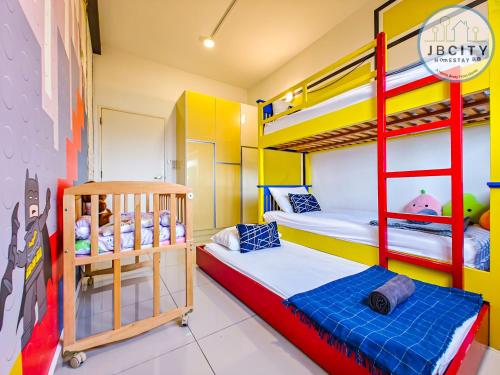 a bunk bed room with two bunk beds in it at Pangsapuri Meridian by RR JBcity in Nusajaya