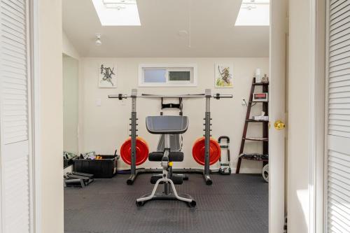 a room with a gym with a treadmill at Cozy and Relaxing Private Getaway Full Amenities in Bellingham