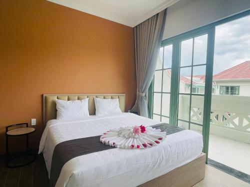 Кровать или кровати в номере Elyday Villa - Bai Khem Beach, Phu Quoc