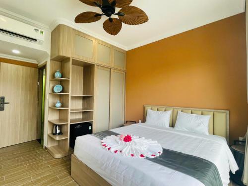Кровать или кровати в номере Elyday Villa - Bai Khem Beach, Phu Quoc